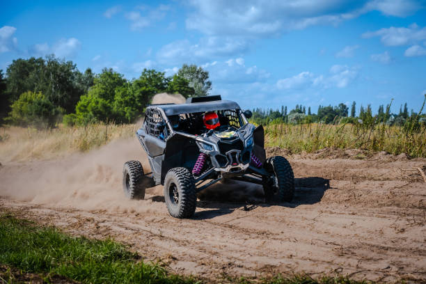 istock ATV and UTV riding in sandy dusty track. Amateur competitions. 4x4. 2059469679