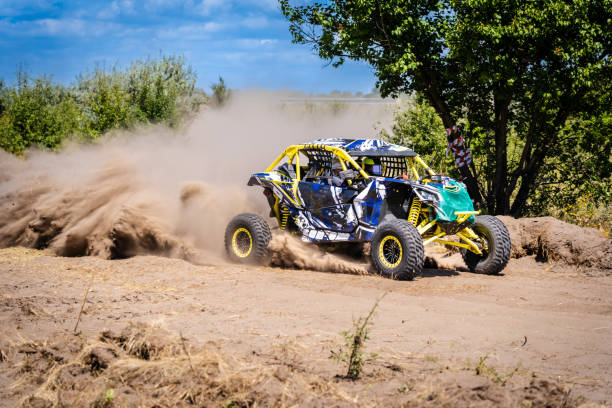 istock UTV kicking up sand on a dune. Extreme. 4x4. 2059469693