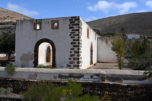 Betancuria, Fuerteventura, Spain, February 27, 2024 - The ruins of the former Franciscan monastery Convento de San Buenaventura in Betancuria, Fuerteventura.