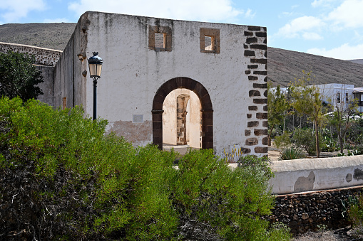 Betancuria, Fuerteventura, Spain, February 27, 2024 - The ruins of the former Franciscan monastery Convento de San Buenaventura in Betancuria, Fuerteventura.