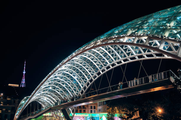 Bridge of Peace in night time, Tbilisi, Georgia - September 2023