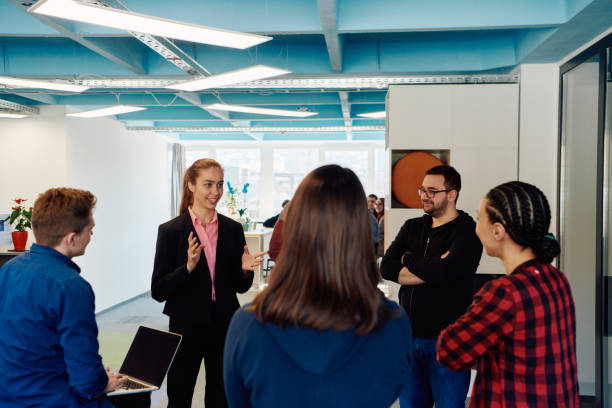 istock A diverse team of young business people exchanging ideas in a modern startup office 2059536200