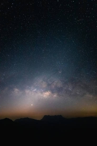 istock Milky way with night landscape silhouettes mountain 2059545951