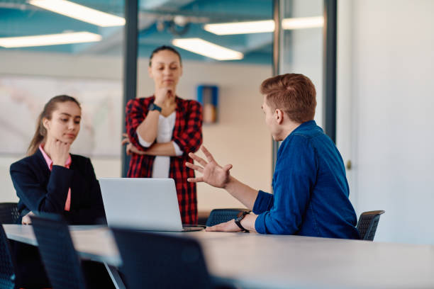 istock A team of successful programmers sits in a startup office, strategizing new business projects and solving existing challenges, showcasing innovation and collaboration in the tech industry 2059547564