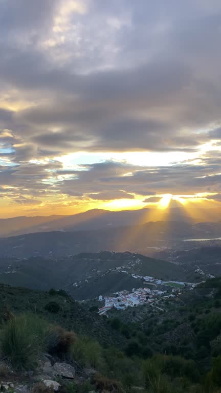 Sunset over valley from hiking trail to Maroma peak in thunderstorm day