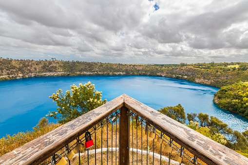 Blue Lake lookout balcony with love locks in Mount Gambier with the Blue Lake in the background, South Australia