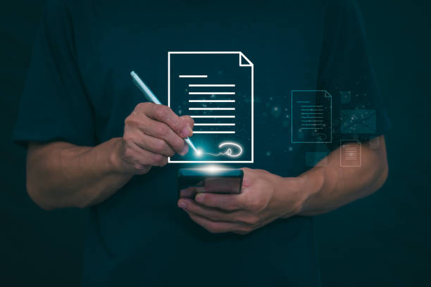 istock The person signing an electronic document on a smartphone, management concept, digital transformation Internet of Things, Big Data and Business Processes, Automated Operations, Data Storage 2059612478