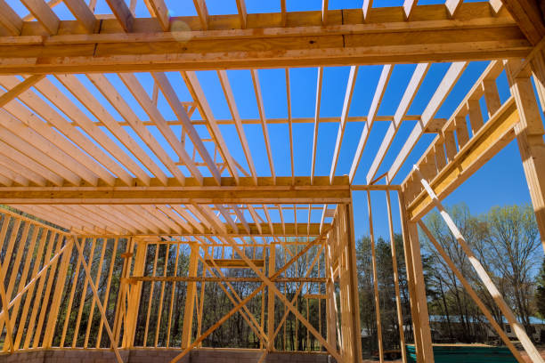 istock An timber wood stick frame framing beams in a during built new house construction 2059631301