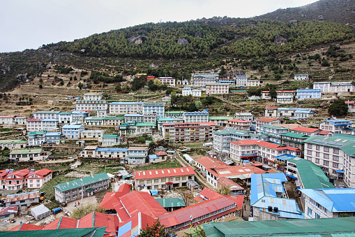 Namche Bazaar scenic valley and town view - the largest town in the Khumbu region and home town of the Sherpas at 3440 meters above sea level and gateway to the Sagarmatha National park, Nepal