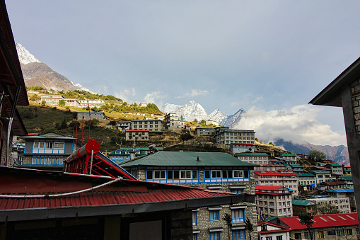 Kusum Kangaru and other peaks visible over the Sherpa town of Namche bazaar in Khumbu region of Nepal