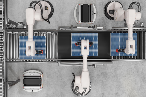 High Angle View Of Smart Distribution Warehouse With Robot Arms Working On Solar Panel Production