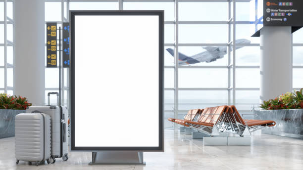пустой рекламный щит в зоне ожидания аэропорта с багажом, пустыми местами и размытым фоном - lightbox airport airplane sign стоковые фото и изображения