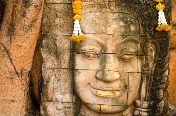 Exploring Ancient Ruins of Bayon Temple at Angkor, Siem Reap