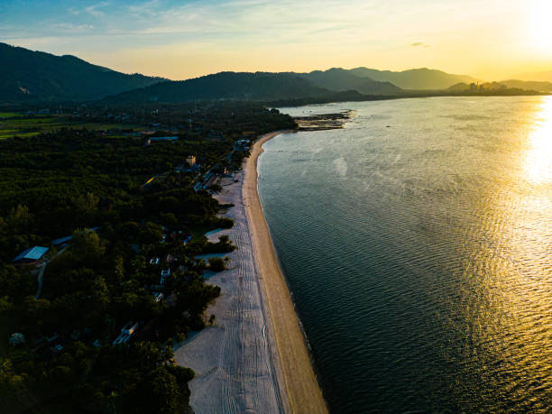 istock A white sandy beach in the rays of the setting sun 2059816713