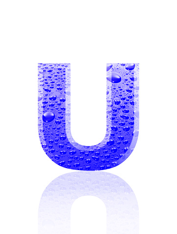 Close-up of three-dimensional water droplets alphabet letter U on white background.