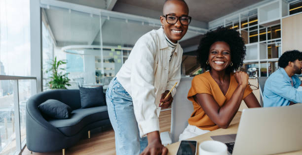 istock Successful businesswomen working together in a creative office 2059943615