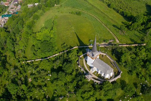 Aerial drone view of Valeni (Magyarvalko) Hungarian reformed church, Transylvania, Romania