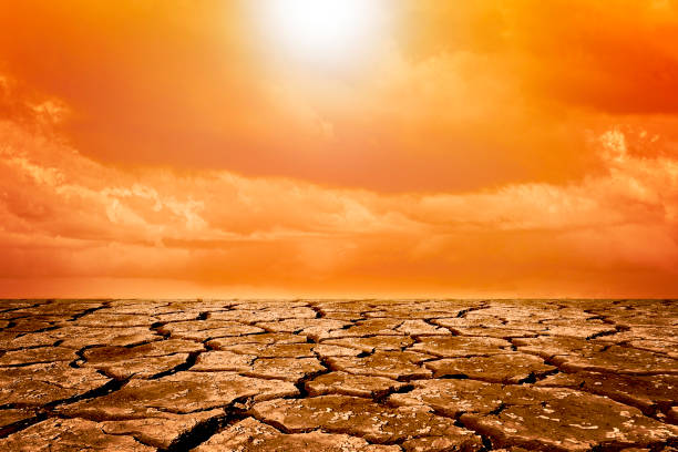 istock cracked ground and cloud and climate change 2059991967