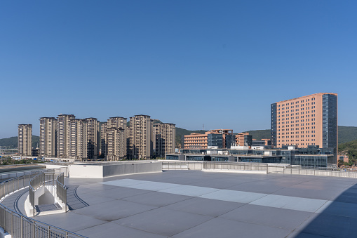 Urban architecture and roofs under the blue sky