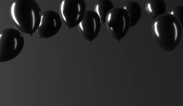istock Black air balloons levitating on dark black background. 2060029171