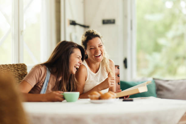 istock Cheerful women having fun while laughing at home. 2060039749