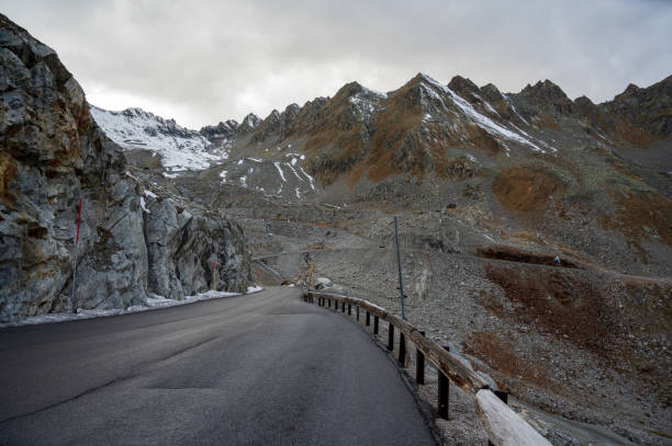 istock Asphalt road high in the Alps. 2060079337