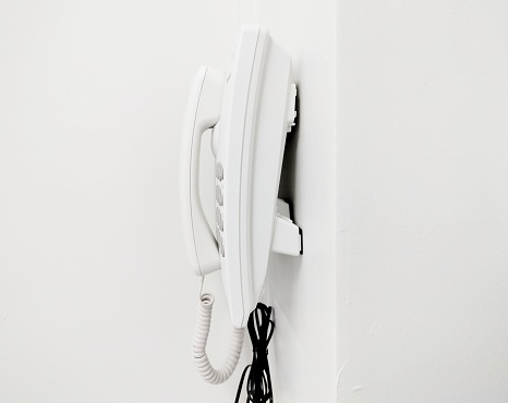 telephone on the wall of the room