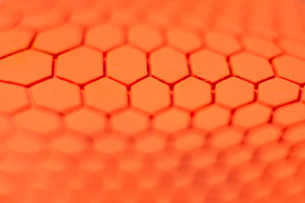 istock Orange hexagon pattern background Is a rubber decorated closeup.Orange hexagon abstract background texture.Macro shot.Blurred shot. 2060110951