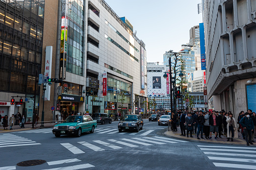 Tokyo, Japan - January 9, 2020. Exterior of the busy streets of Tokyo, near the famous Shibuya Crossing.