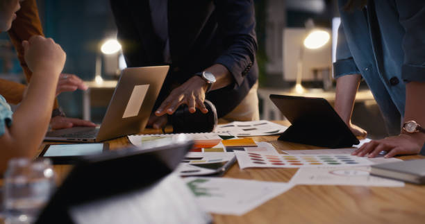 istock Hands of designer, night or planning for color code brainstorming, research or strategy choice. Closeup, people meeting or group of creative employees in teamwork collaboration to share project ideas 2060127417