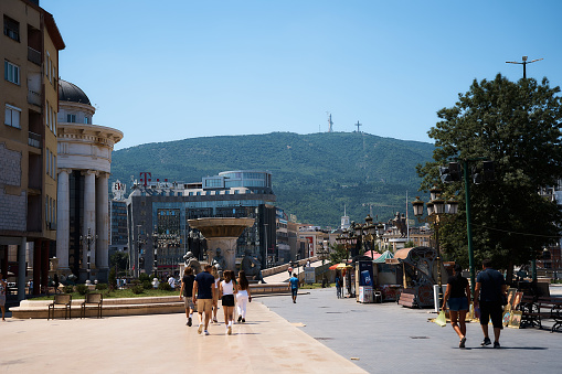 Skopje Macedonia, July 21, 2022:     people stroll through the city on a summer day in Skopje