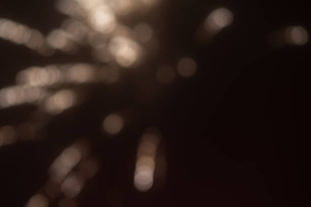 Abstract blurred beautiful firework for background.colorful firework for celebration.Festive fireworks colorful display dark background.Beautiful light for celebration.Happy new year 2022 wallpaper.