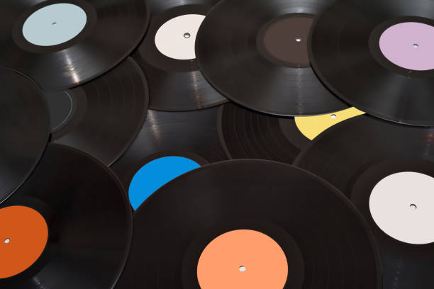 istock Pile of LP old vinyl records on the table 2060162111