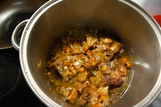 Cooking beef stew slow cooking stock photo