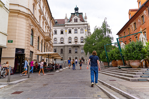 Sightseeing tour at the old town of City of Ljubljana on a cloudy summer day. Photo taken August 9th, 2023, Ljubljana, Slovenia.