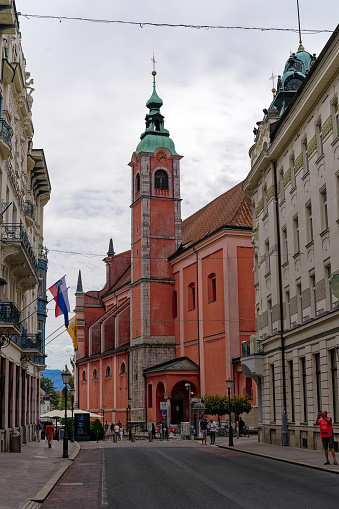Preseren Square at the old town City of Ljubljana with Franciscan Annunciation church on a cloudy summer day. Photo taken August 9th, 2023, Ljubljana, Slovenia.