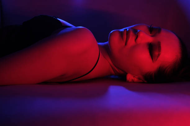 istock Seductive Young Woman in Colorful Neon Lights 2060188857