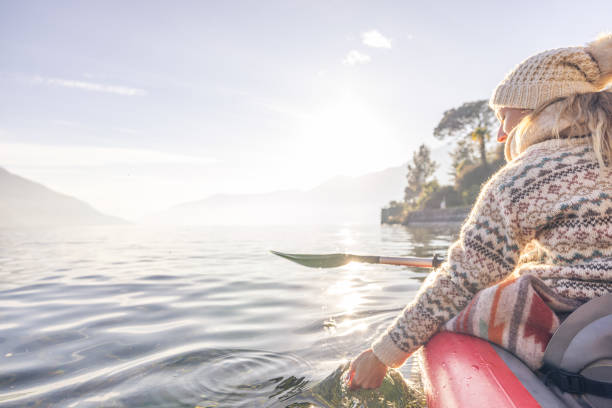 istock Female relaxes in a canoe 2060201208