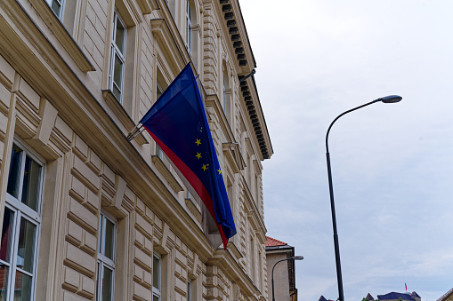 European Union flags in front of the Berlaymont building in Brussels, Belgium