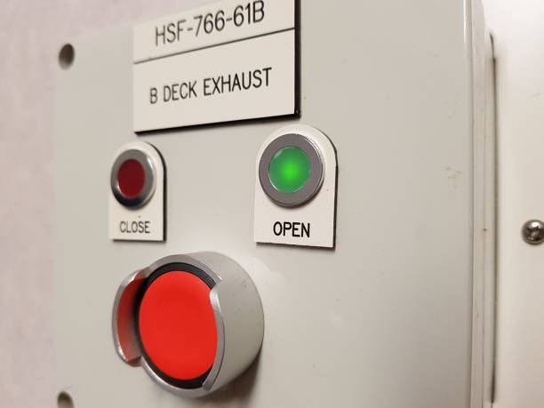 istock Close-up of a control panel with a red button and green buttons 2060236517