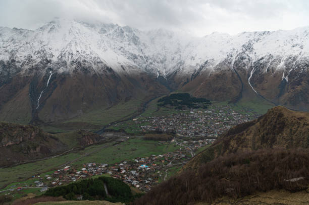 The Mountain along the way to Kazbergi. Beautiful view of the city of Mtskheta. stock photo