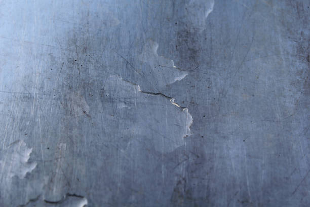 istock Water on a grey gray metal surface close up abstract textured background 2060243184