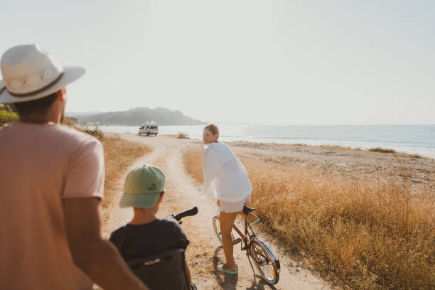 istock Young family exploring coastline on bicycles in summertime 2060251135