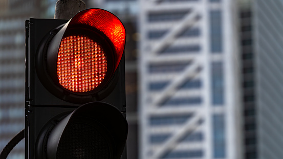 Close up of a traffic light on red