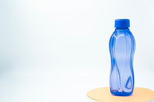 Drinking water in plastic bottle. Photo is taken in 16 bit color depth with medium format camera