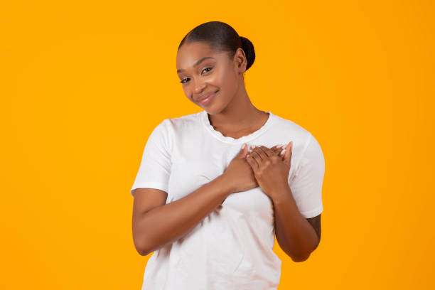 istock Grateful African American Young Lady Pressing Hands To Chest, Studio 2060278404