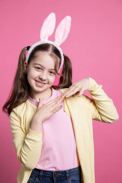 istock Cute young girl dancing and fooling around on camera 2060280158