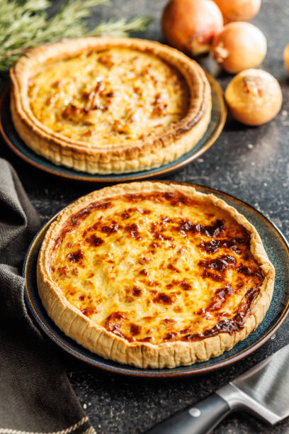 istock Traditional french pie. Quiche lorraine on kitchen table. 2060289497