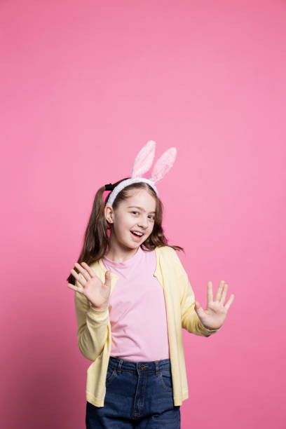 istock Little child acting excited and cheerful about easter festivity 2060293457