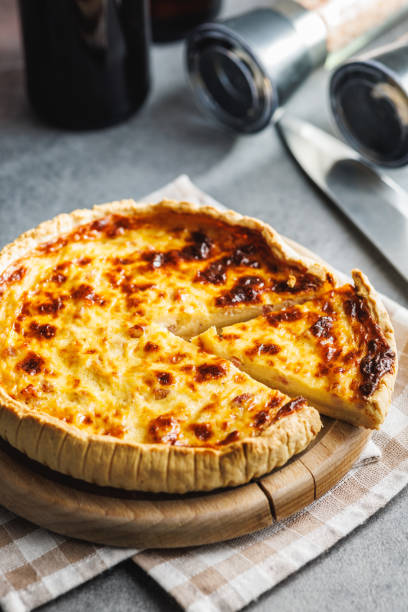 istock Traditional french pie. Quiche lorraine on kitchen table. 2060294009